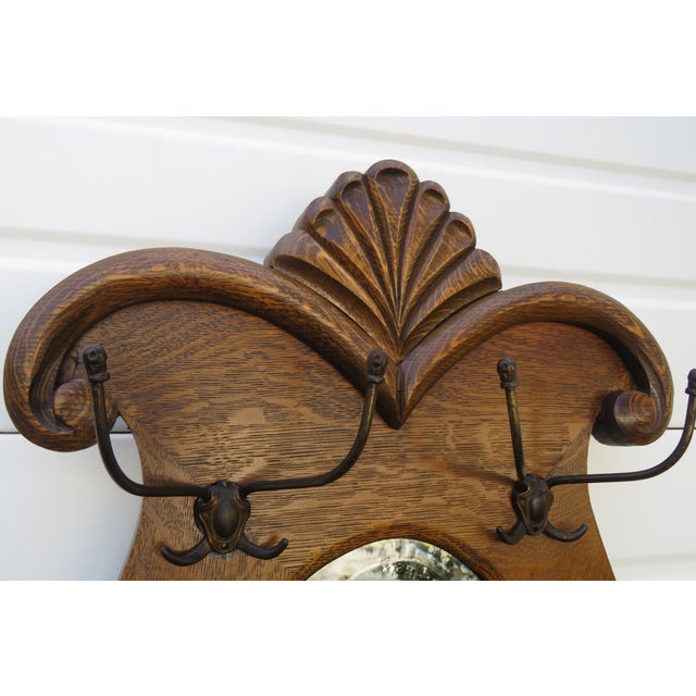 Early 1900s Victorian Carved Oak Hall Tree Coat Hat Stand With Mirror and a Seat For Sale In Miami - Image 6 of 12