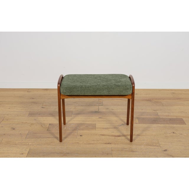 A stool made in Denmark in the 1960s. The frame is made of teak wood with a unique organic form, cleaned of old surfaces...