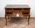 Description: Antique Neapolitan Louis XV center-of-room desk made of olive wood burl with inlays of fine exotic woods. The...