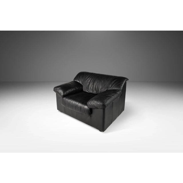 Introduce a striking piece of post-modern design to your living space with this exquisite four-seat sofa with matching...