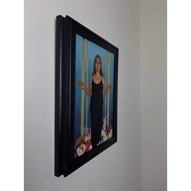 Figurative Bring Forth Miracles by Aixa Oliveras | Oil and 24kt gold leaf on panel Woman in black dress surrounded by flowers. For Sale - Image 3 of 5