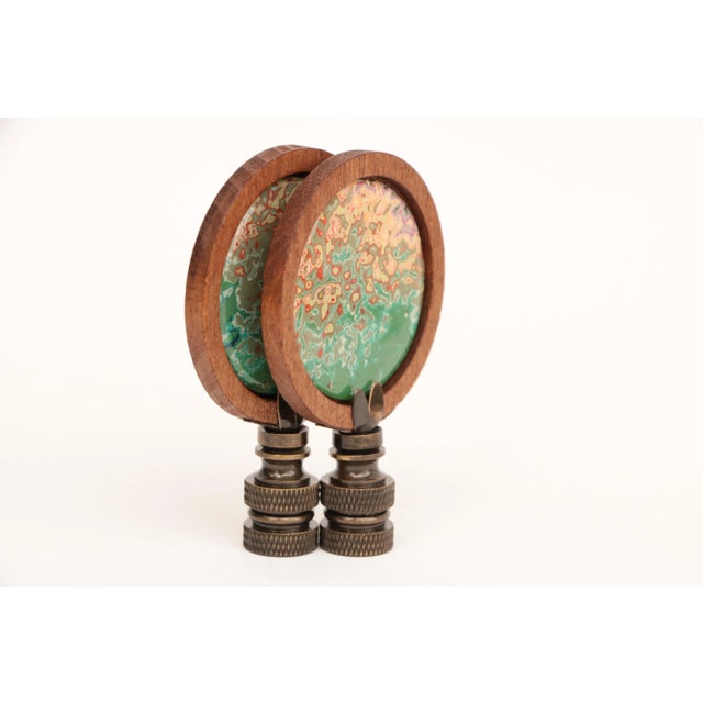 Pair of lamp finials crafted from hand polished graffiti paint, reclaimed from public areas which have been repeatedly...