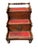 Antique steps concealing a commode. The steps are mahogany with red tooled leather treads. The center step pulls forward...