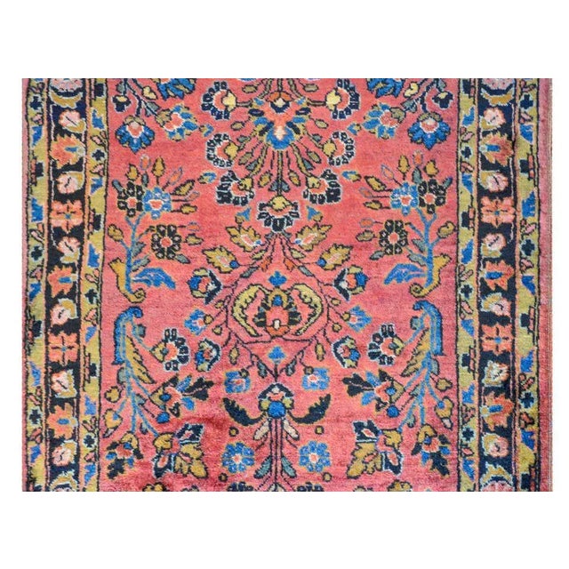 A wonderful early 20th century Persian petite Sarouk rug with a beautiful floral and scrolling vine pattern woven in light...