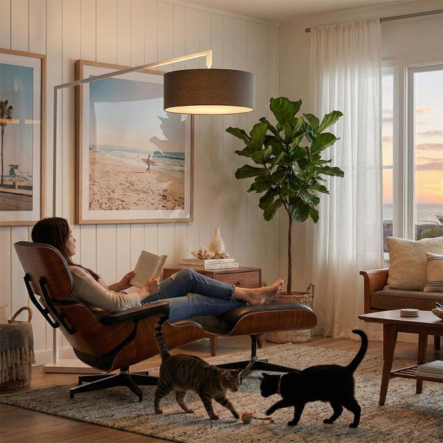 Designed by Kirby Groce in 2011, the Stretch Arc Lamp is a modern arc lamp featuring a white steel body and a white...