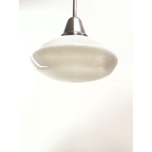 Vintage Hanging Light in White Opal Glass, 1950s, in Very Good conditions. Designed 1950 to 1959 Up to 250V (Europe/UK...