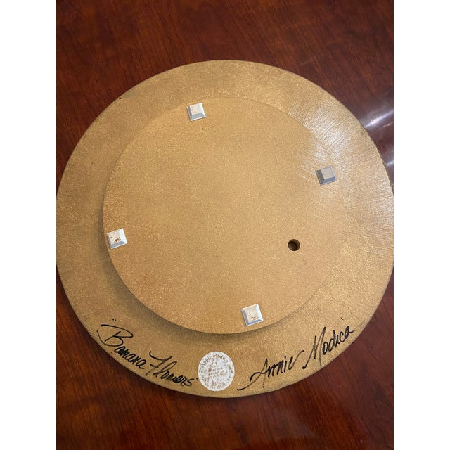 This is a vintage Annie Modica rotating lazy Susan, circa 1990-2000. Bold colors of yellows, golds and reds. Makes a...