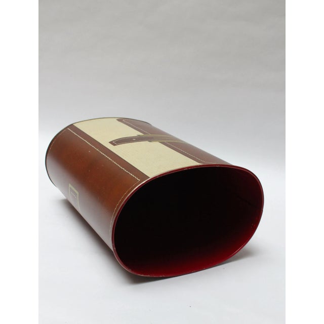 Lithographed sheet steel "pocketbook" wastebasket manufactured by Cheinco (ca. 1975, USA). Cheinco, a mid-1970s division...