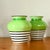 This pair of gorgeous, eye-catching vintage vases are something of an enigma. They have a distinctly Art Deco aesthetic...