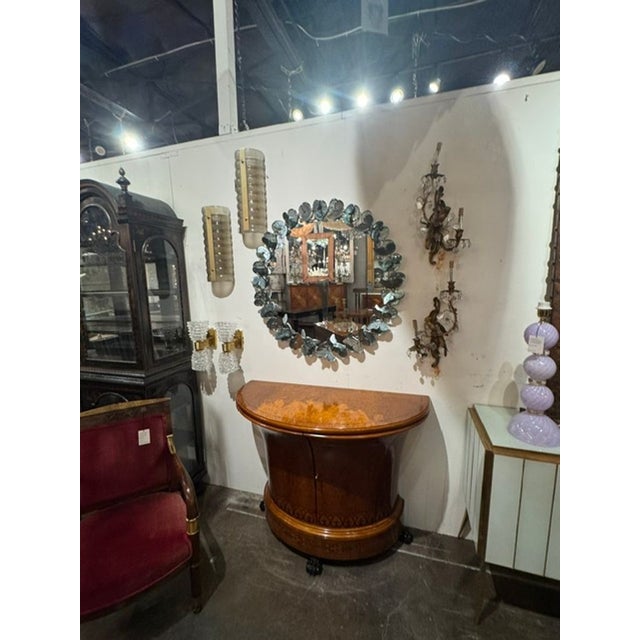 The Murano Glass Butterfly Mirror in Fontana Green is a stunning decorative piece. The intricate design features a...