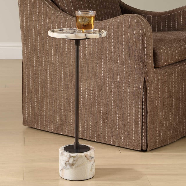 Brunson Features A Minimalist Dark Bronze Metal Stem, Elegantly Supporting A Round Tray Top And A Cylindrical Base. Both...