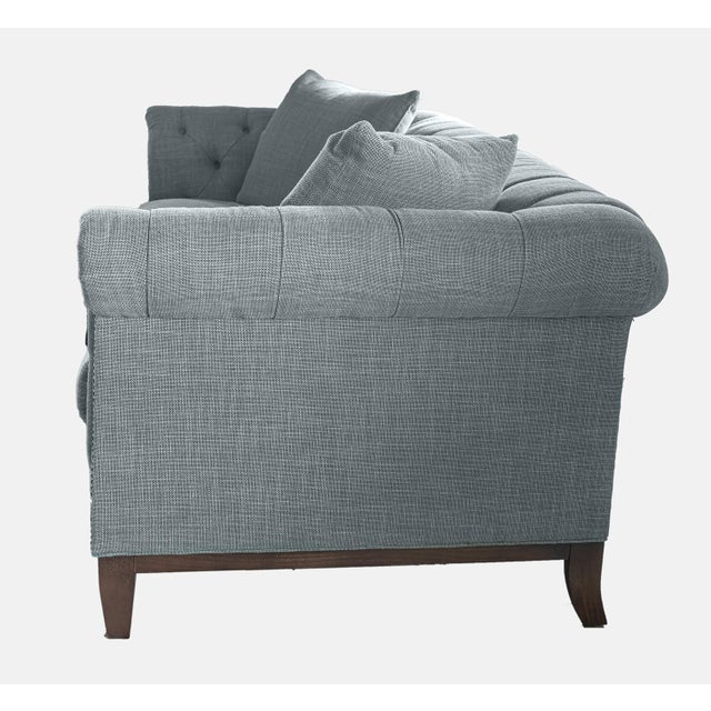 Add a touch of enduring elegance to your home with this Lee Industries Chesterfield sofa (#3183-03), a true classic that...