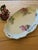 Antique Haviland Limoges oval serving platter featuring a delicate thistle floral motif and classic French porcelain...