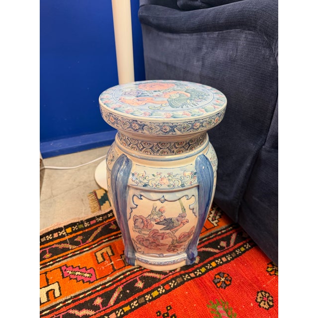 Very cheery ceramic garden stool. The colors of tropical sunset pink, lavender and sky blue accentuate the beauty of this...
