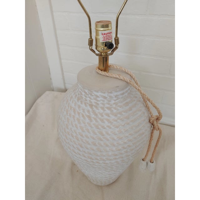 Here's the perfect nautical motif lamp for a neutral pallet. This 1970s oil jar shaped lamp still retains original tags...