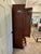 A complete cherry queen headboard bed wall unit by American furniture maker, Thomasville. This unit consists of queen size...