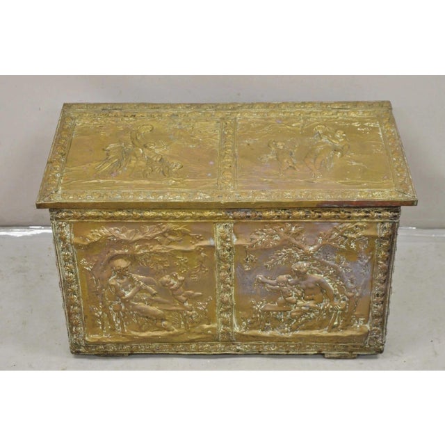Antique English Victorian Brass Figural Repousse Coal Bin Storage Blanket Chest Trunk. Item features various repousse...