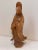 Bring a touch of serenity to your space with this vintage hand-carved Guanyin sculpture. Crafted from warm honey-toned...