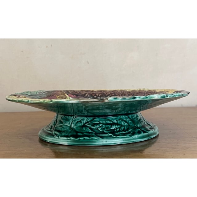 Antique begonia leaf design majolica low footed compote in Fall colors. Made in England at the end of the 19th Century.