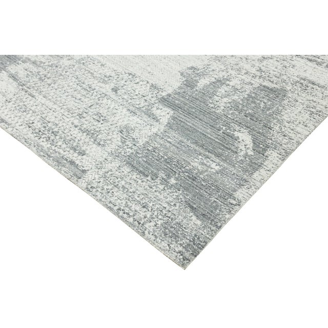 Versatile Freya Gray Handmade Wool Rug, Country of Origin: India. This exceptional piece offers a sophisticated,...