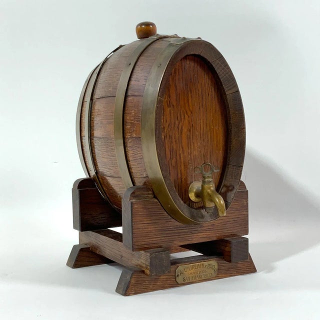 French oak cask on stand for A. Giurlani + Bros Importers, San Francisco. Carefully crafted and stropped barrel with brass...
