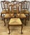 This elegant Vintage French Louis set of six dining chairs brings timeless French charm to any dining room or traditional...