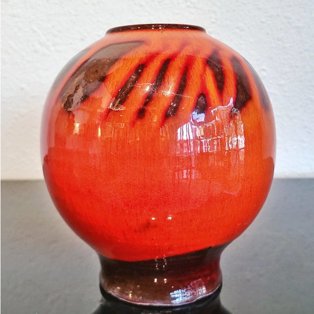 A beautiful glossy orange and brown footed orb vase from the studio of Elly & Wilhelm Kuch, Nuremberg, Germany TÖPFEREI...