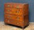 A handsome British military officer’s Campaign Ware chest of drawers or dresser, from the 19th century, featuring a...