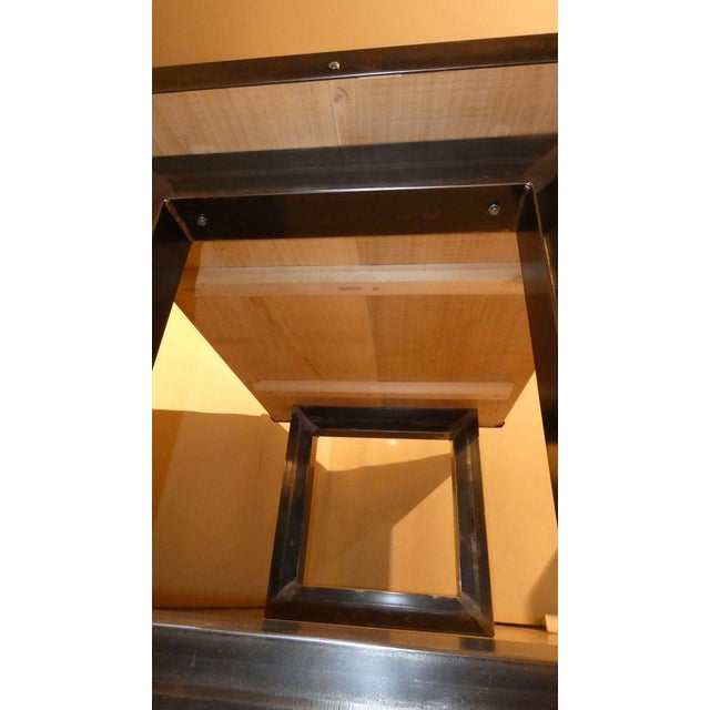 Restoration of an industrial table with a 4,5 cm thick solid maple top, treated and sanded. Subsequently finished with...