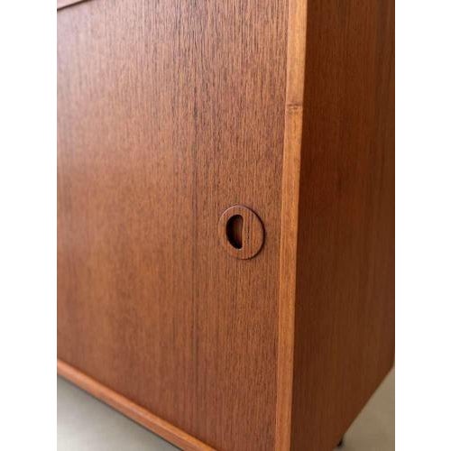 This Musterring sideboard from the 1960s demonstrates the power of simplicity. A clean, mid-century design with sleek...