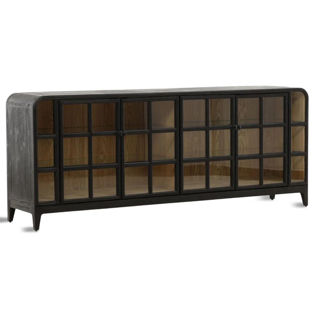 Beautiful black finish fir wood credenza / sideboard with square paneled glass window doors. Rounded edge design gives a...