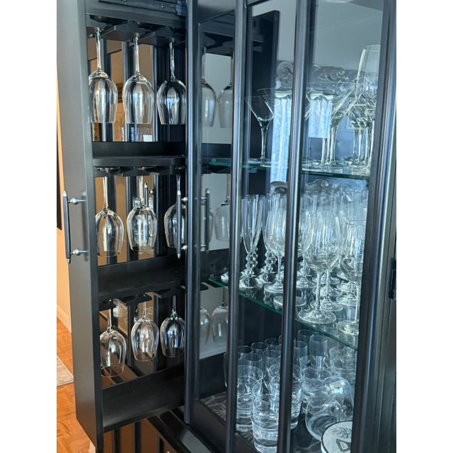 Where traditional craftsmanship meets modern sophistication. This stunning china cabinet from Broyhill's Perspectives...