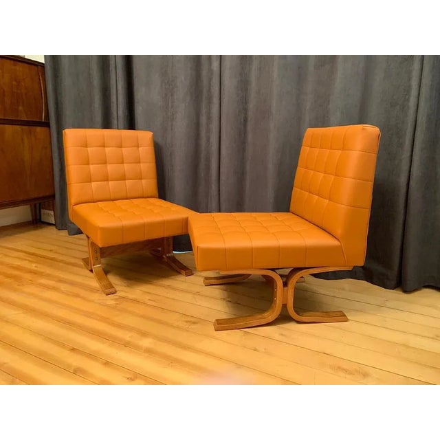 A pair of armchairs by Ludvik Volak for Drevopodnik Holesov from the 1960s. In original and very good condition. The...
