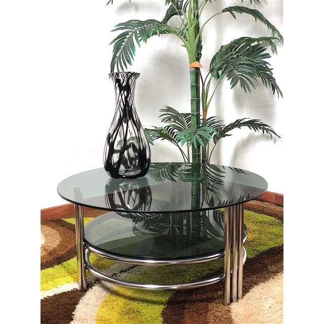 Vintage murano glass flower vase from the 1970s. The vase is italian-made from the 1970s, made of murano glass and signed...