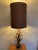 Large impressive lamp with large gold flower blooms. Giltwood base measures 6”.
