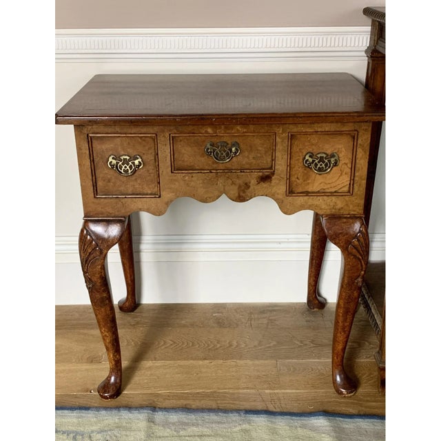 Vintage Queen Anne style burl walnut lowboy with three dovetail drawers, brass pulls, nicely shaped apron and cabriole...