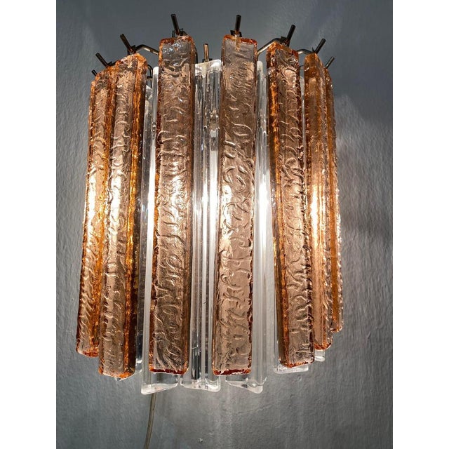 Fantastic pair of vintage Murano wall sconces composed of 19 Murano crystal prisms (triedri) for each sconce in a chrome...