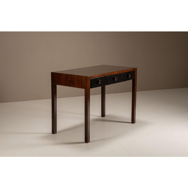 Confident and composed, this vanity - or writing desk attributed to Vittorio Dassi was produced in Italy in 1939, at a...