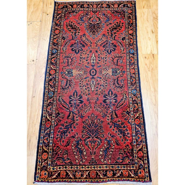 "A beautiful antique Persian Lilian Sarouk rug from the early 1900s, handwoven in the renowned weaving region of Western...