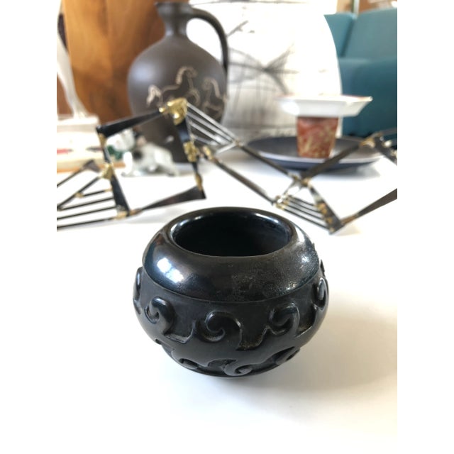 From the estate of a prominent collector. - Hand coiled and sculpted small seed pot by Linda Tafoya. Very unique deep hand...
