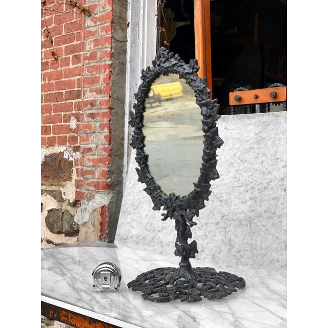A Victorian Cast Iron Grape Vine Motif Table Mirror, United States, c. Early/Mid 20th Century. This Table Mirror would...