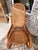 Beautiful pair of vintage bentwood cane rocking chairs. Features classic curved wood frames with woven cane backs and...