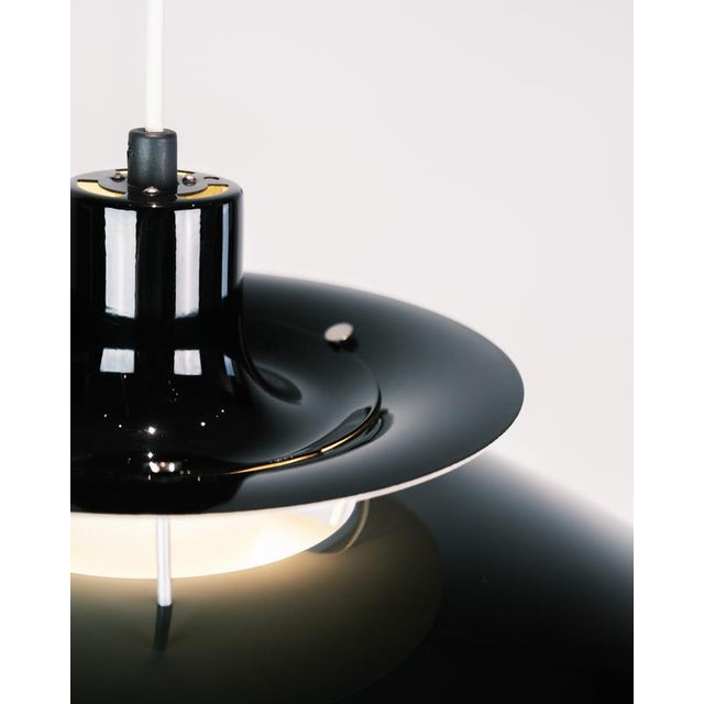 Ph5 lamp designed by poul henningsen in 1958 and manufactured by louis poulsen. The lamp has lacquered metal shades in...