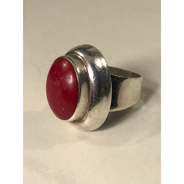 This lovely Vintage Mexican Red Carnelian Sterling Ring is sure to garner lots of oohs and aahs when worn. This eye-...