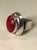 This lovely Vintage Mexican Red Carnelian Sterling Ring is sure to garner lots of oohs and aahs when worn. This eye-...