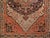 Beautiful Persian Farahan Sarouk area rug in a medallion floral pattern in navy blue, terracotta Red, and camel colors...