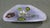 A vibrant Murano Tutti Frutti art glass bowl with a soft lavender-purple ground, white cased underside, silver leaf-style...