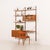This teak wall unit with a desk-shelf was designed by poul cadovius and made by cado in the 1960s. Its simple form...