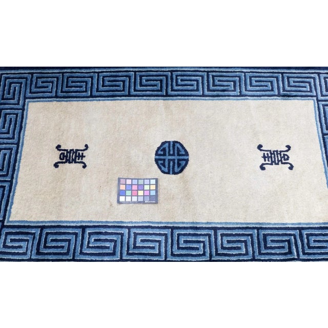 The Chinese carpets from the 19th century onward, in traditional patterns, often blue-and-white, in room sizes, scatters,...