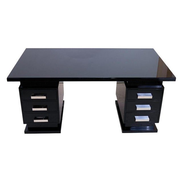 Black desk Modernist desk Strict form. France around 1950. Black lacquer. Three full-length drawers on each side....